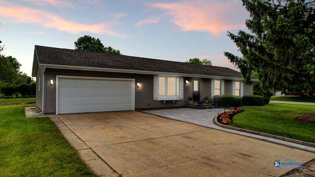 1510 Hillside Ln, Mchenry, IL 60051 - ranch-style home featuring an attached garage, driveway, a front lawn, and roof with shingles