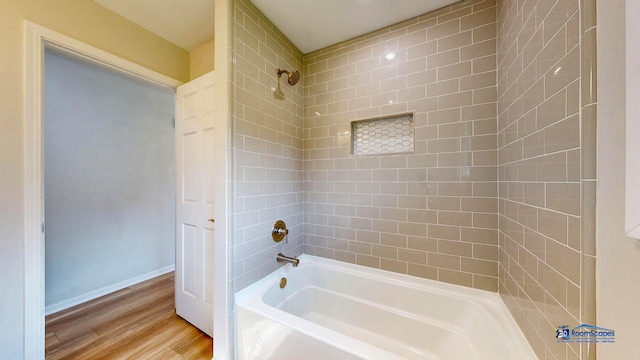 1510 Hillside Ln, Mchenry, IL 60051 - bathroom featuring bathtub / shower combination, wood finished floors, and baseboards