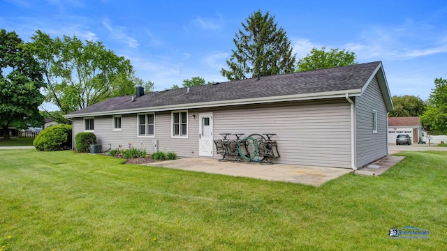 1510 Hillside Ln, Mchenry, IL 60051 - rear view of house featuring a lawn, a patio area, and roof with shingles