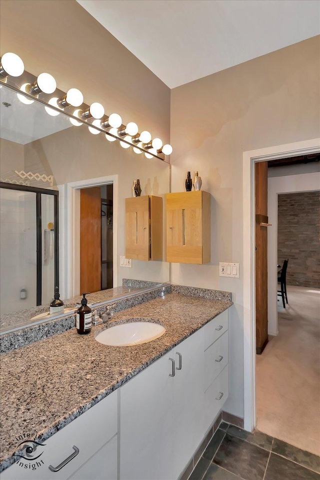 360 W Illinois St Unit 114, Chicago, IL 60654 - bathroom with vanity and tile patterned floors