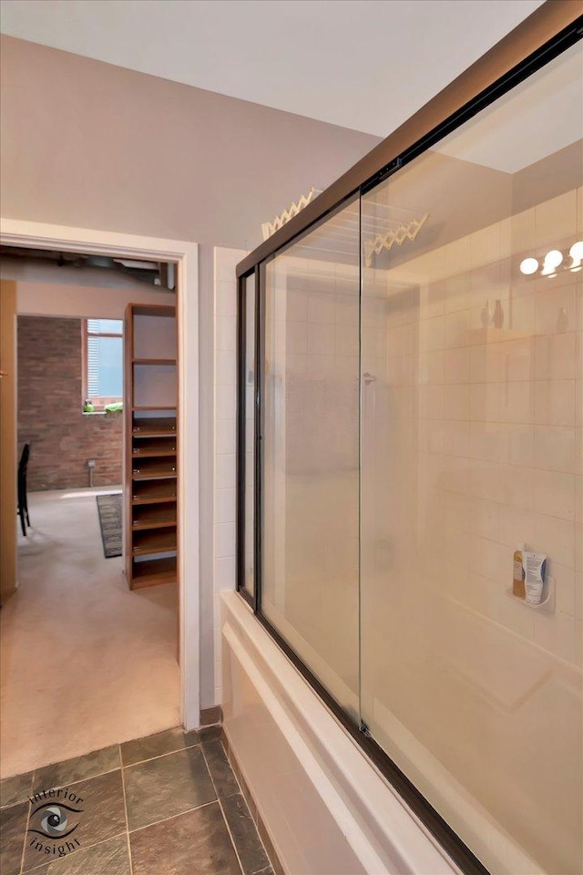 360 W Illinois St Unit 114, Chicago, IL 60654 - bathroom featuring enclosed tub / shower combo