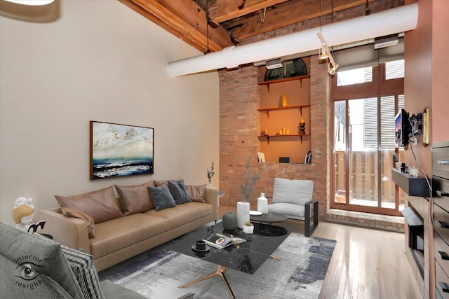 360 W Illinois St Unit 114, Chicago, IL 60654 - living room with wood finished floors and a high ceiling