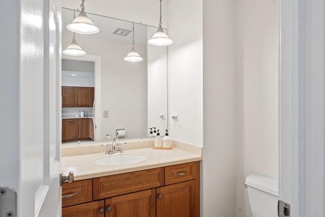 1805 E Tano Ln, Mount Prospect, IL 60056 - bathroom featuring toilet and vanity
