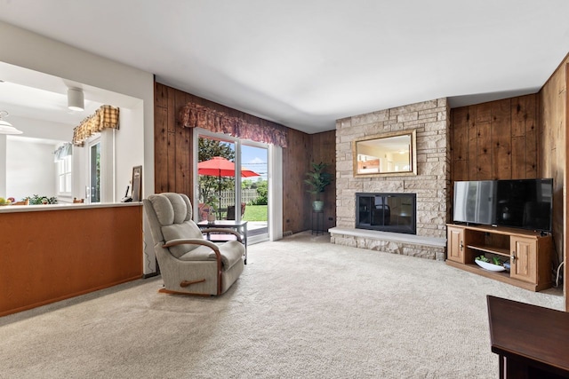 1805 E Tano Ln, Mount Prospect, IL 60056 - carpeted living room featuring wooden walls and a fireplace