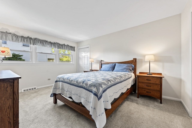 1805 E Tano Ln, Mount Prospect, IL 60056 - bedroom featuring light carpet, baseboards, and a closet