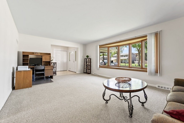 1805 E Tano Ln, Mount Prospect, IL 60056 - living room with light carpet, a desk, and baseboards