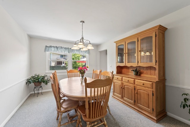 1805 E Tano Ln, Mount Prospect, IL 60056 - dining room with a chandelier, light colored carpet, and baseboards