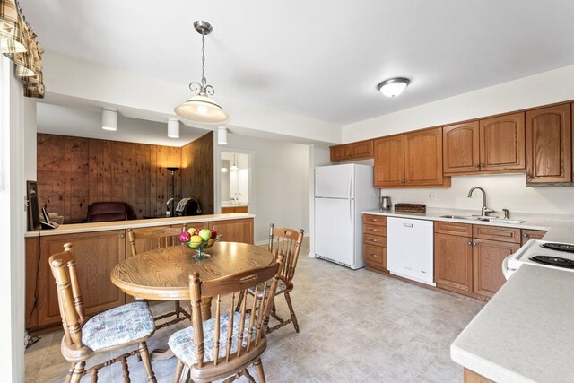 1805 E Tano Ln, Mount Prospect, IL 60056 - kitchen featuring white appliances, a sink, light countertops, and brown cabinets