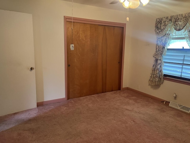 204 Elm St, Morrison, IL 61270 - spare room featuring carpet flooring and ceiling fan
