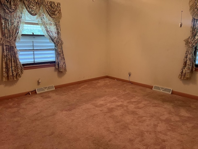 204 Elm St, Morrison, IL 61270 - unfurnished room with light colored carpet and baseboards