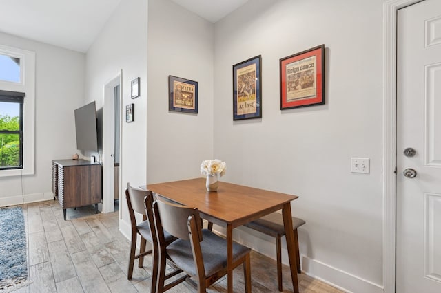 1423 N Ashland Ave Unit 201, Chicago, IL 60622 - dining room with light wood finished floors and baseboards