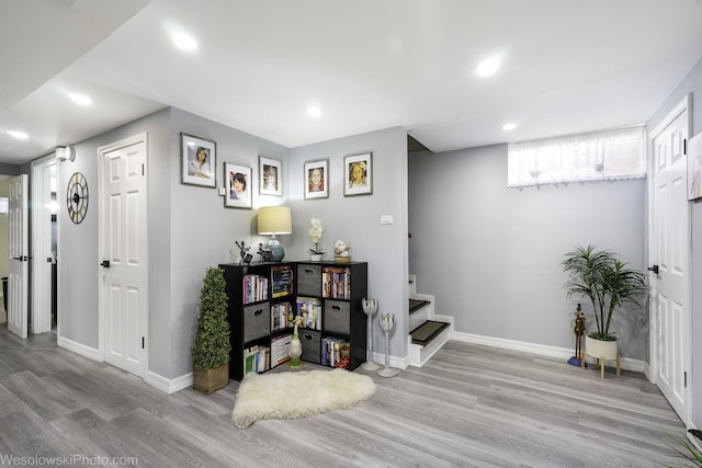 5036 Ozark Ave, Norridge, IL 60706 - basement featuring wood finished floors, baseboards, stairway, and recessed lighting