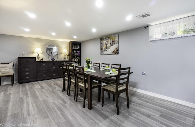 5036 Ozark Ave, Norridge, IL 60706 - dining space with light wood-type flooring, baseboards, and recessed lighting