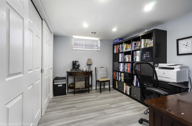 5036 Ozark Ave, Norridge, IL 60706 - home office with light wood-style flooring and recessed lighting