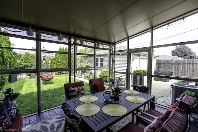 5036 Ozark Ave, Norridge, IL 60706 - sunroom / solarium featuring healthy amount of natural light and outdoor dining space