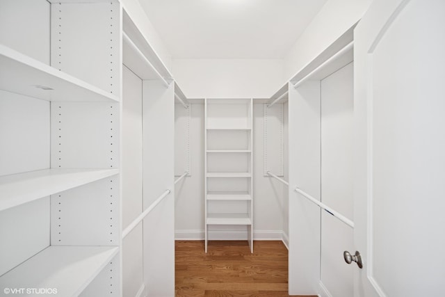 3560 S Giles Ave Unit 2, Chicago, IL 60653 - walk in closet with wood finished floors
