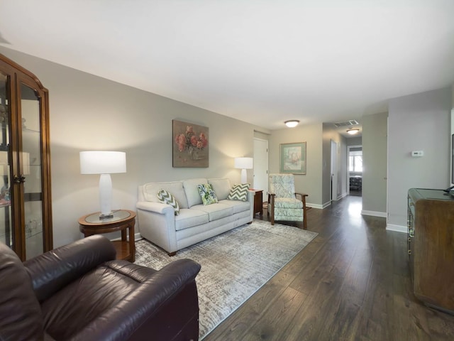258 Brookside Ln Unit B, Willowbrook, IL 60527 - living area with dark wood-style flooring and baseboards