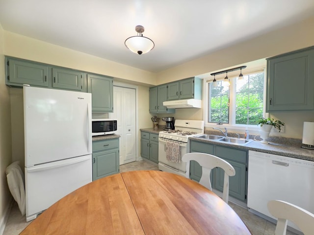 258 Brookside Ln Unit B, Willowbrook, IL 60527 - kitchen featuring white appliances, a sink, under cabinet range hood, green cabinetry, and light tile patterned floors