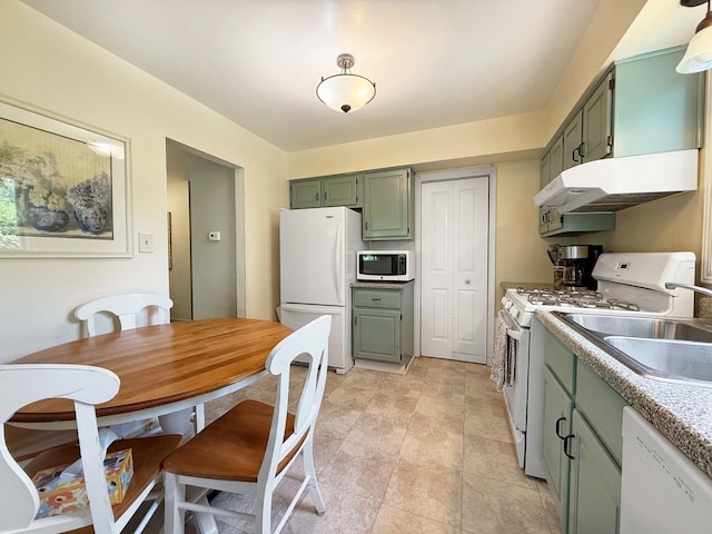 258 Brookside Ln Unit B, Willowbrook, IL 60527 - kitchen with green cabinets, white appliances, under cabinet range hood, and a sink
