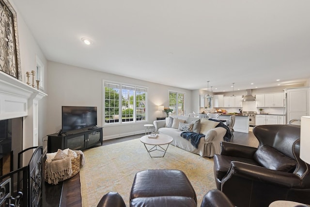 5417 Lawn Ave, Western Springs, IL 60558 - living area with wood finished floors, recessed lighting, and a fireplace