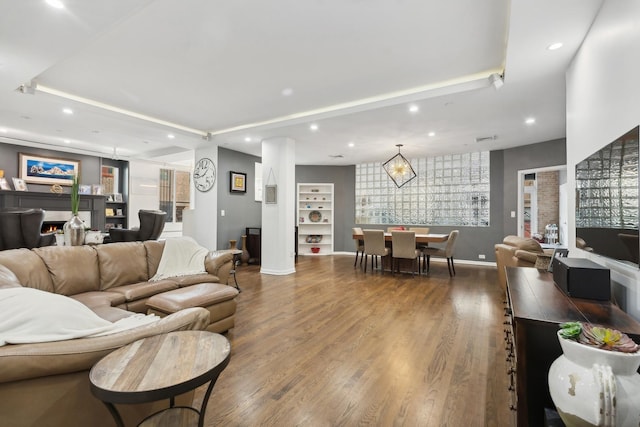 727 S Dearborn St Unit 911, Chicago, IL 60605 - living room with wood finished floors, recessed lighting, and a chandelier