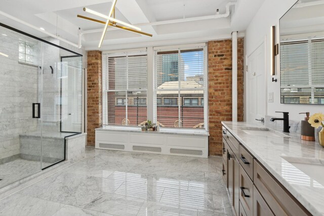 727 S Dearborn St Unit 911, Chicago, IL 60605 - full bathroom featuring double vanity, a shower stall, a raised ceiling, brick wall, and marble finish flooring