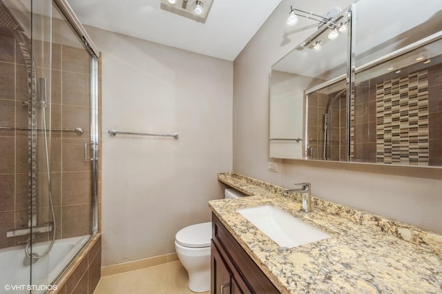 4250 N Marine Dr Unit 1628, Chicago, IL 60613 - full bath featuring vanity, toilet, tiled shower / bath combo, tile patterned floors, and baseboards