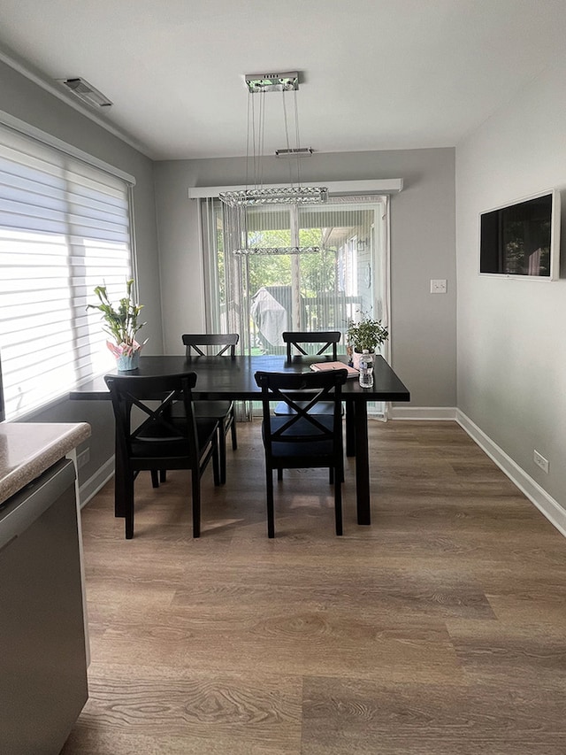 985 W Ct Unit D, Naperville, IL 60563 - dining room with baseboards and dark wood-type flooring