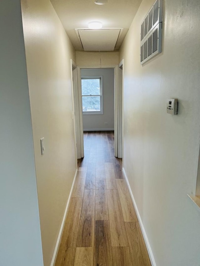 238 Chippewa Ct Unit D, Bolingbrook, IL 60440 - hallway featuring attic access, wood finished floors, and baseboards