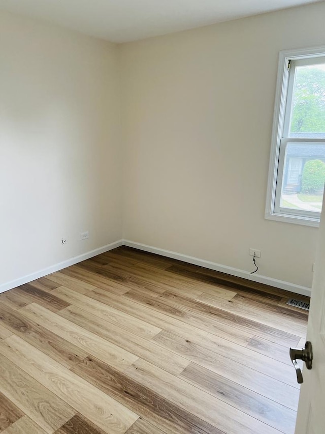 238 Chippewa Ct Unit D, Bolingbrook, IL 60440 - unfurnished room with wood finished floors and baseboards