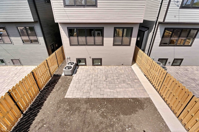 3903 N Drake Ave, Chicago, IL 60618 - fenced backyard with a patio