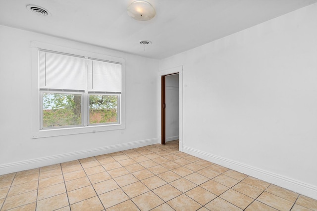2022 S Halsted St, Chicago Heights, IL 60411 - spare room with baseboards and light tile patterned floors