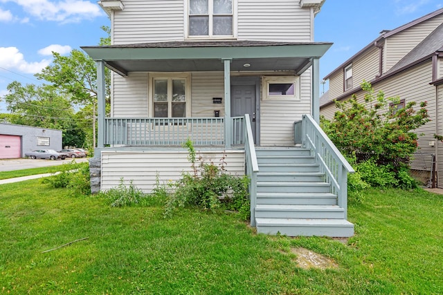 2022 S Halsted St, Chicago Heights, IL 60411 - american foursquare style home featuring a porch and a front lawn