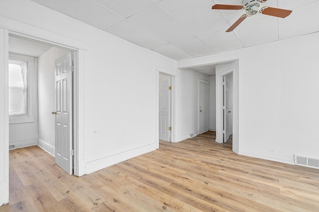 2022 S Halsted St, Chicago Heights, IL 60411 - empty room featuring light wood-style floors, a ceiling fan, and baseboards