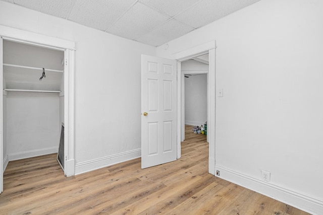 2022 S Halsted St, Chicago Heights, IL 60411 - unfurnished bedroom featuring light wood finished floors, baseboards, and a closet