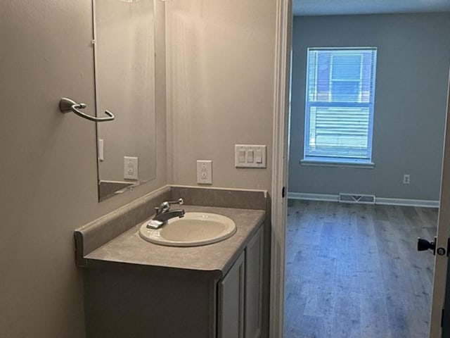 1117 Cutter Ave, Joliet, IL 60432 - bathroom with vanity and baseboards