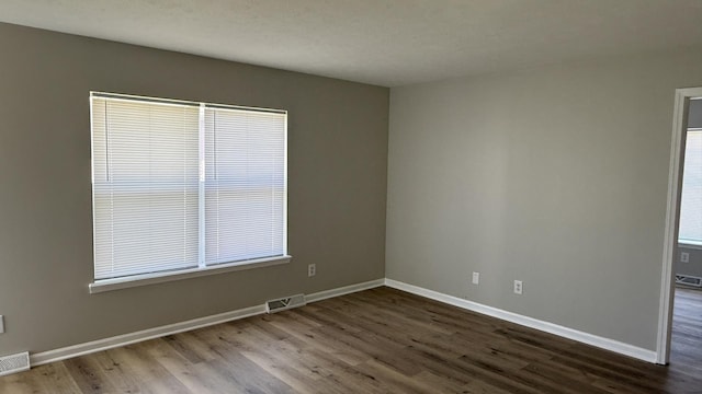 1117 Cutter Ave, Joliet, IL 60432 - unfurnished room with wood finished floors and baseboards