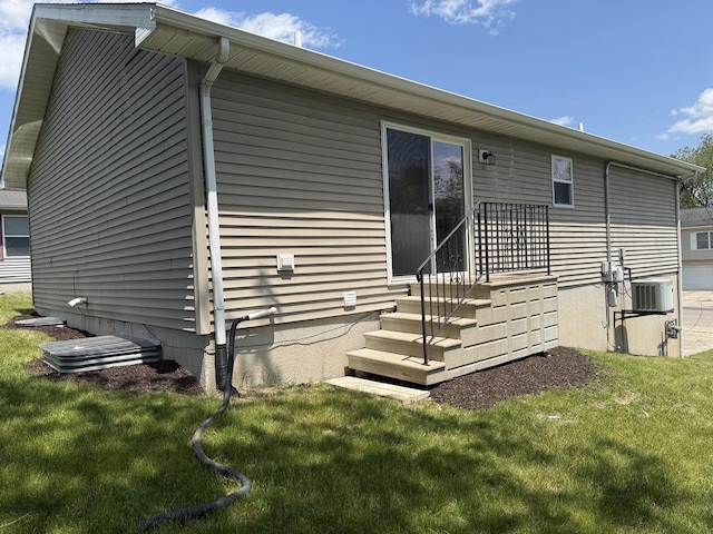 1117 Cutter Ave, Joliet, IL 60432 - rear view of property with a lawn