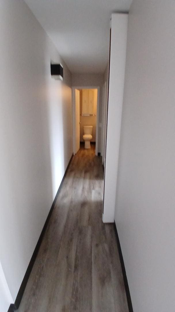 4850 S Lake Park Ave Unit 1409, Chicago, IL 60615 - corridor featuring wood finished floors