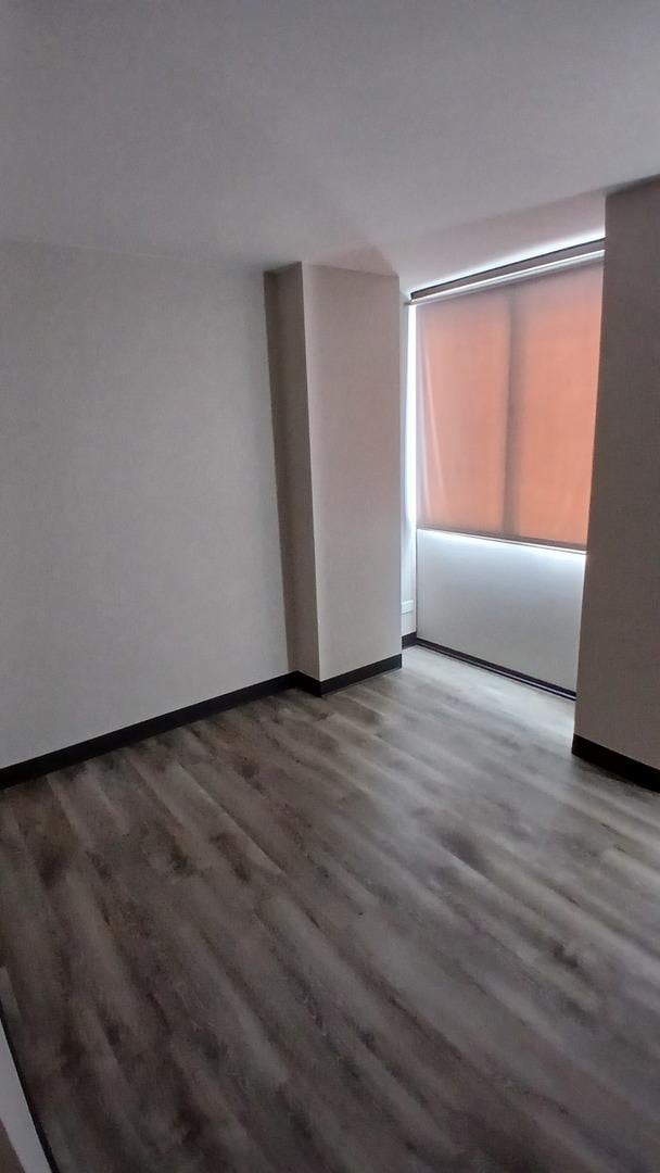 4850 S Lake Park Ave Unit 1409, Chicago, IL 60615 - unfurnished room with wood finished floors and baseboards