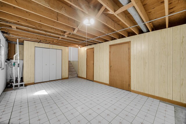 3795 Whispering Trails Dr, Hoffman Estates, IL 60192 - finished basement with stairway, light floors, and wooden walls