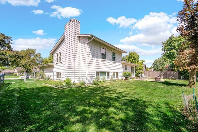 3795 Whispering Trails Dr, Hoffman Estates, IL 60192 - rear view of house featuring a chimney