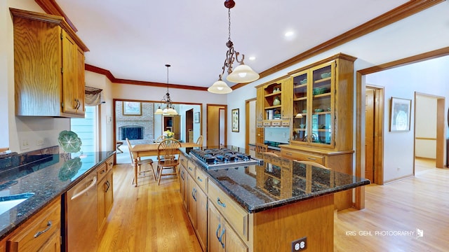1420 Greenlake Dr, Aurora, IL 60502 - kitchen with stainless steel appliances, light wood-style flooring, pendant lighting, a center island, and ornamental molding