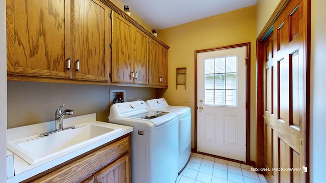 1420 Greenlake Dr, Aurora, IL 60502 - laundry room with cabinet space, separate washer and dryer, and light tile patterned flooring