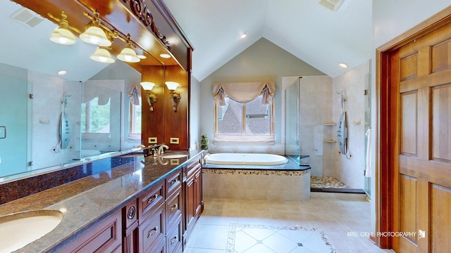 1420 Greenlake Dr, Aurora, IL 60502 - bathroom featuring tile patterned floors, a shower stall, a bath, double vanity, and vaulted ceiling