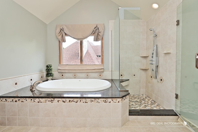 1420 Greenlake Dr, Aurora, IL 60502 - bathroom featuring a shower stall, a garden tub, vaulted ceiling, recessed lighting, and tile patterned floors