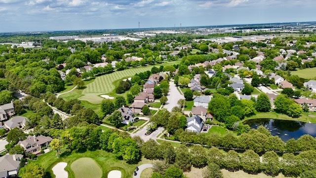 1420 Greenlake Dr, Aurora, IL 60502 - aerial view of residential area with a golf course and a large body of water