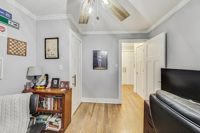 1049 Fowler Ave, Evanston, IL 60202 - home office featuring light wood-style flooring, crown molding, a ceiling fan, and baseboards