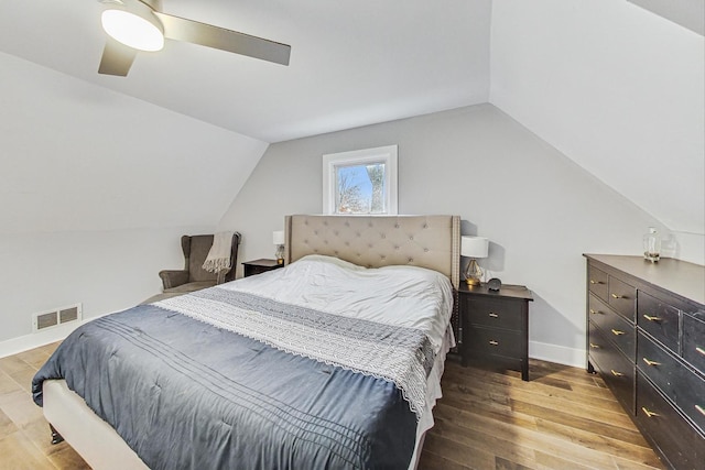 1049 Fowler Ave, Evanston, IL 60202 - bedroom featuring wood finished floors, vaulted ceiling, ceiling fan, and baseboards