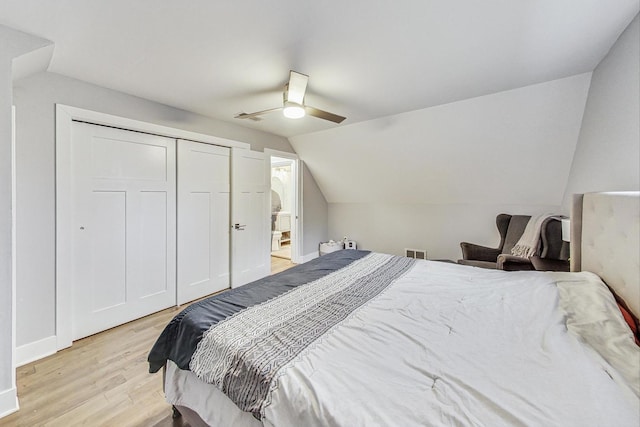 1049 Fowler Ave, Evanston, IL 60202 - bedroom featuring light wood-style floors, vaulted ceiling, ceiling fan, a closet, and baseboards